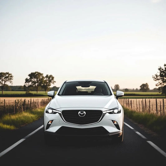 Mazda CX-3 Essence 2.0 150 blanche sur route