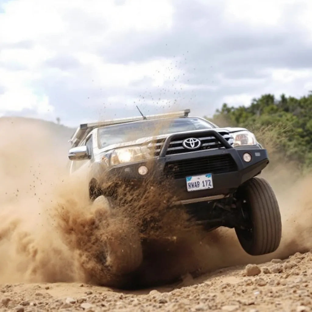 Toyota Hilux VIII sur un chemin hors route