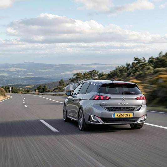 Peugeot 308 II Essence 1.2 PureTech on a road