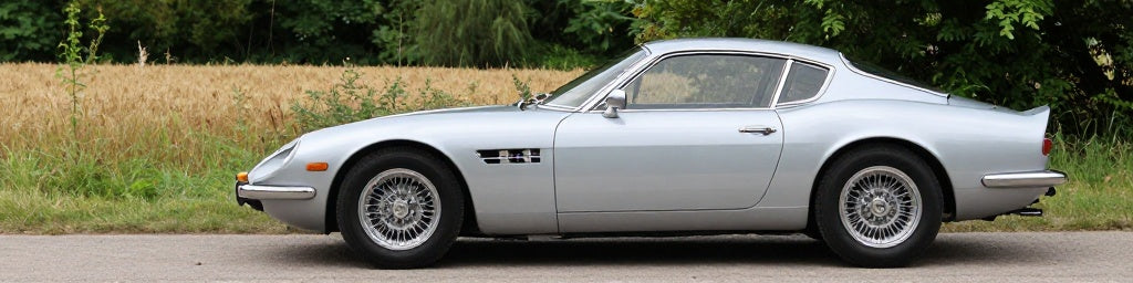 Maserati Coupé Essence 4.2 V8 argentée sur route