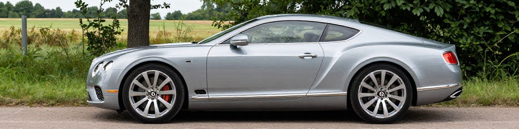 Bentley Continental GT Essence 6.0 W12 sur route de campagne